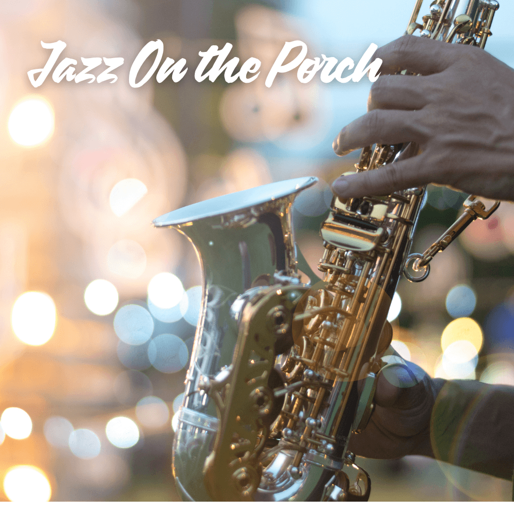 A close-up of a hand playing a saxophone, with colorful bokeh lights in the background.