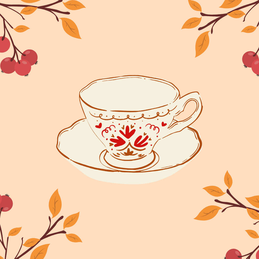 A decorative tea cup on a saucer, surrounded by autumn leaves and berries.