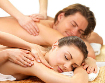 Woman and man having a couples massage